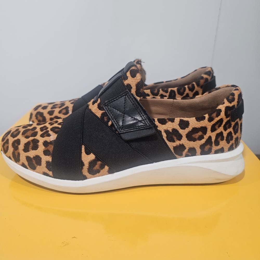 Clarks Leopard Print Slip-On Sneakers in Brown and Black